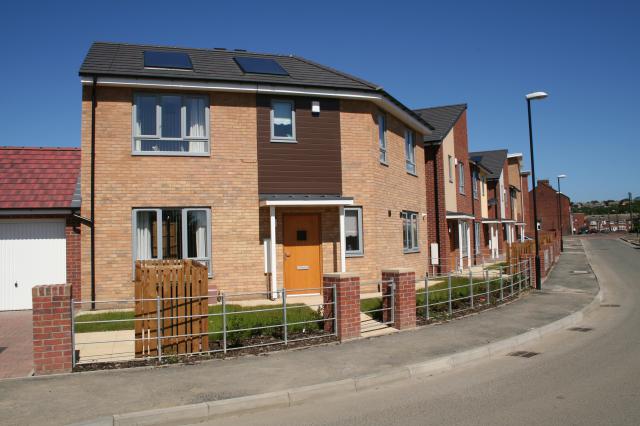 St Catherine's, Castletown, housing on the south east perimeter. A continuous terrace to act as an acoustic barrier against traffic noise from the A1231